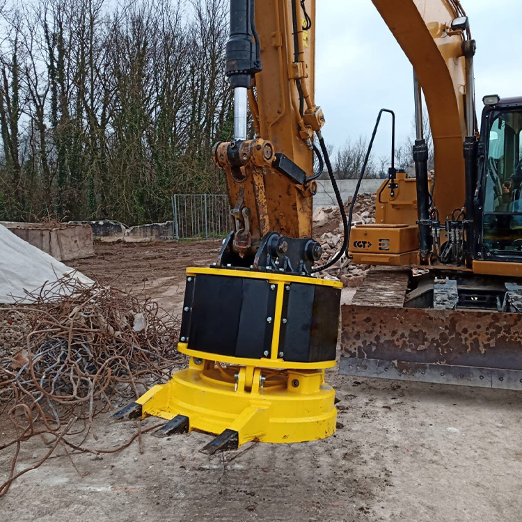 excavator magnet attachment with teeth on demolition site