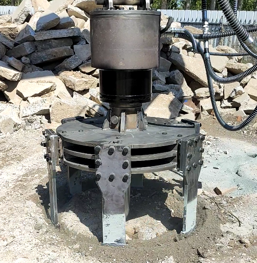 close view of manhole cover cutter attachment for road repair