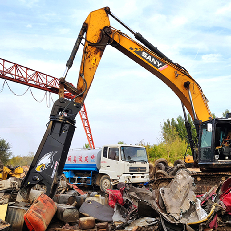 excavator demolition shear cutting heavy metal debris on site