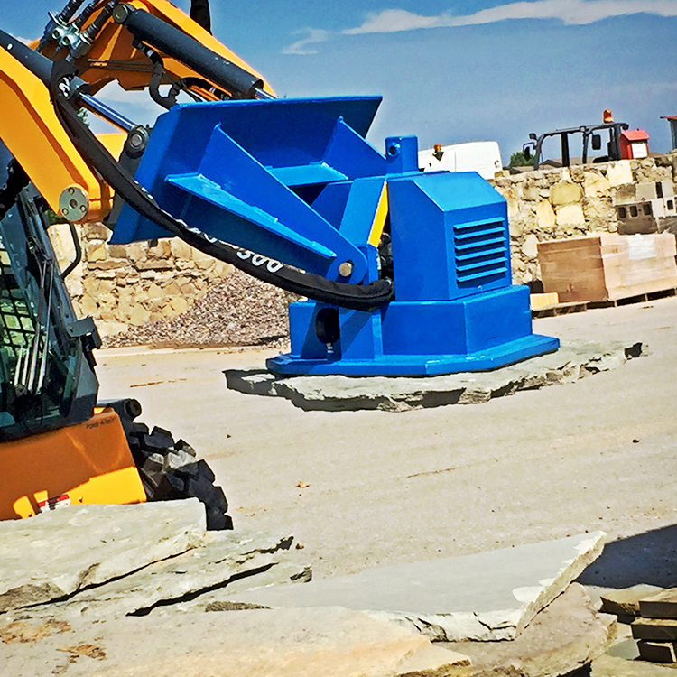 hydraulic lifting magnet attachment in outdoor work area