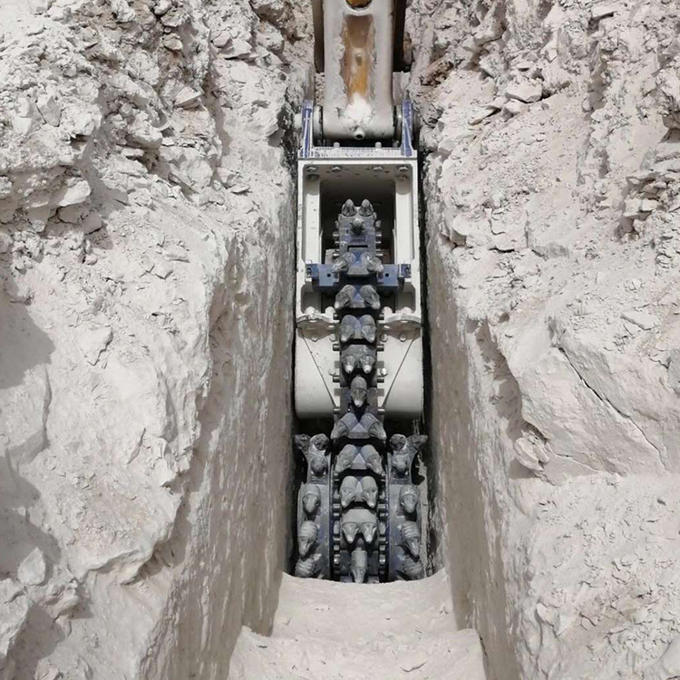 continuous cutting head working in a narrow trench