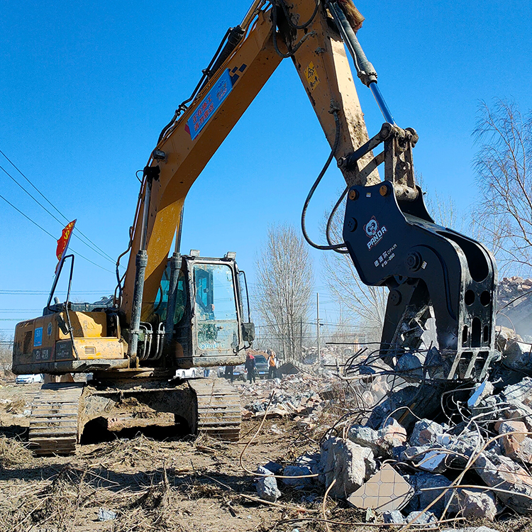 hydraulic pulverizer excavator attachment processing rubble