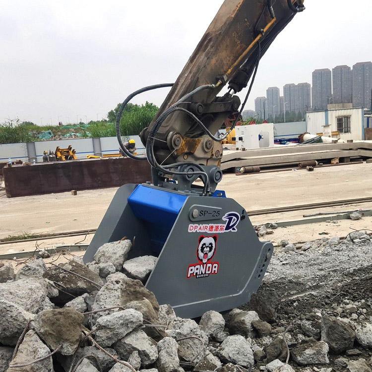 excavator crusher bucket crushing concrete on-site