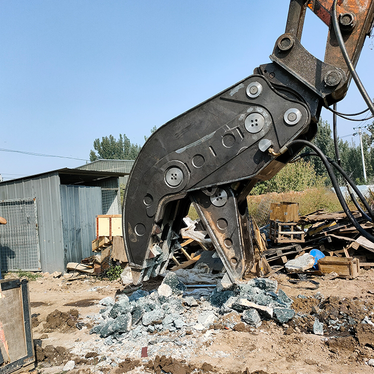 hydraulic pulverizer processing concrete debris