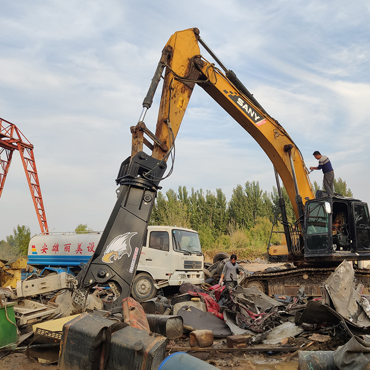 scrap and demolition shear working in heavy metal scrap yard