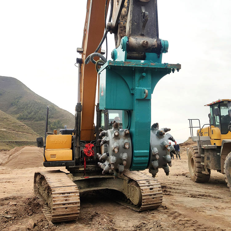 excavator drum cutter attachment mounted on excavator at jobsite
