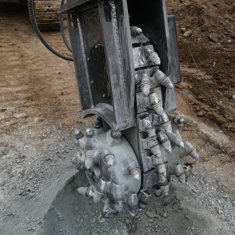 drum and chain cutting wheel close-up on excavator attachment