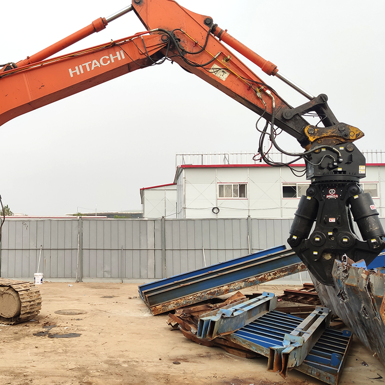 demolition shear on excavator processing large steel scrap