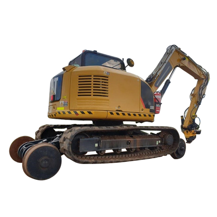 Road-rail excavator rear side view with rail wheels