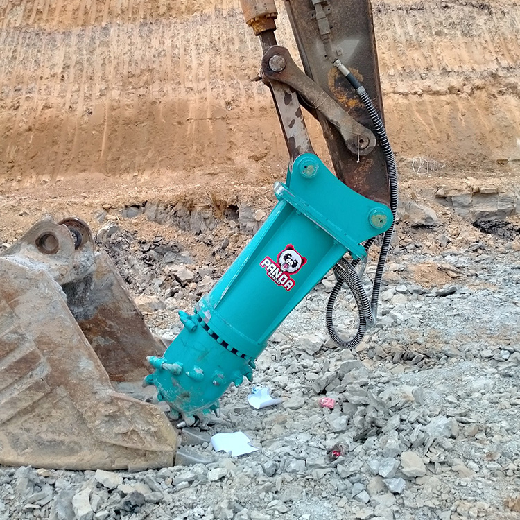 milling attachment cutting rocky ground with excavator