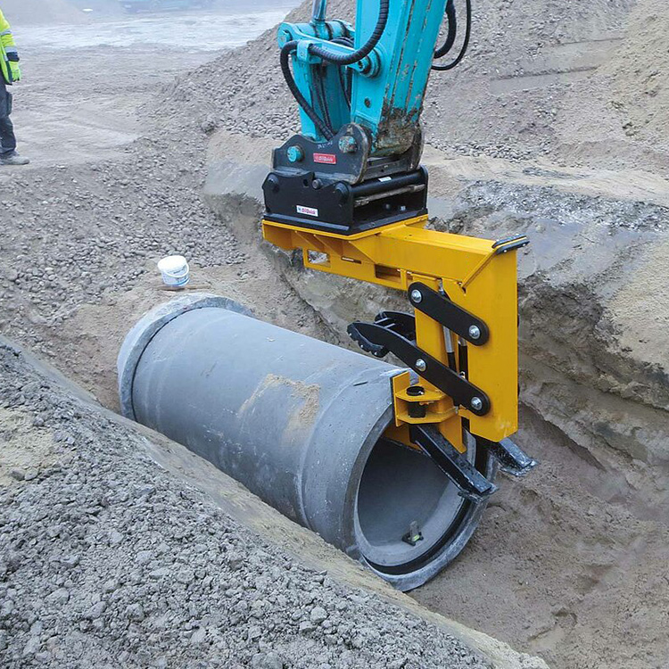 Pipe Lifter lowering a concrete pipe into a trench with an excavator