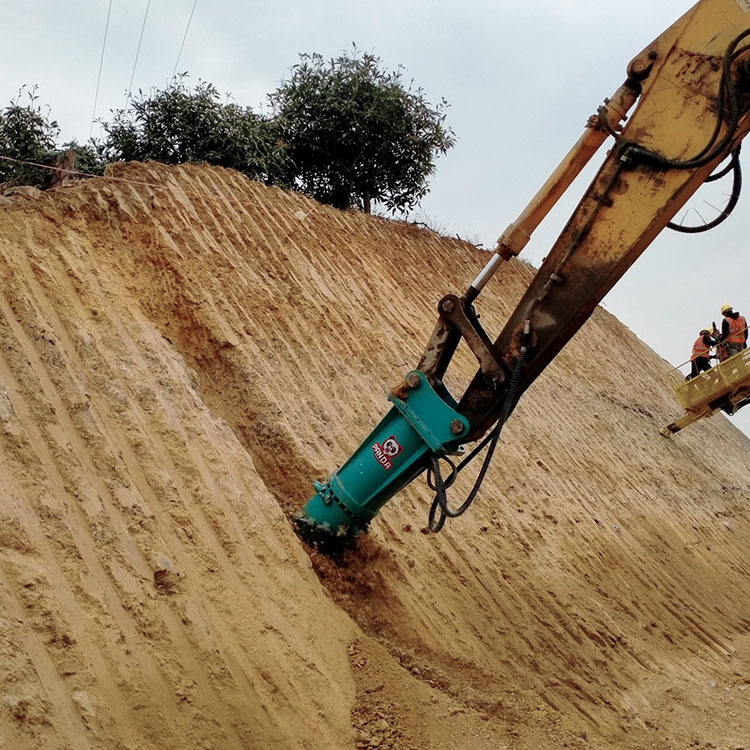 vertical cutter head trimming steep earth slope
