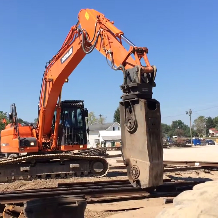 excavator rail cutter working on railway track