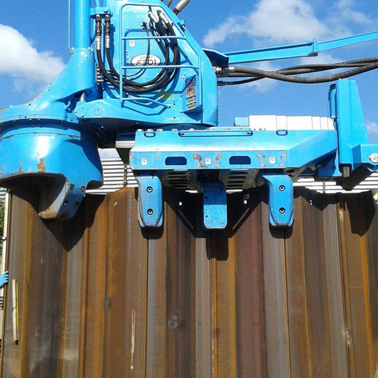 Press-in Machine close-up during hydraulic sheet pile installation