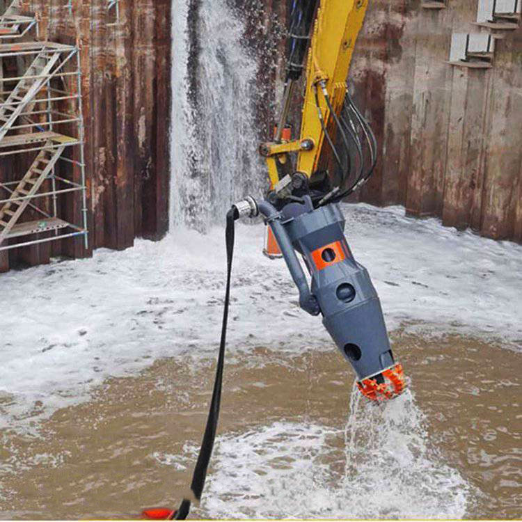 Cutterhead Dredge Pump removing sediment beside retaining wall