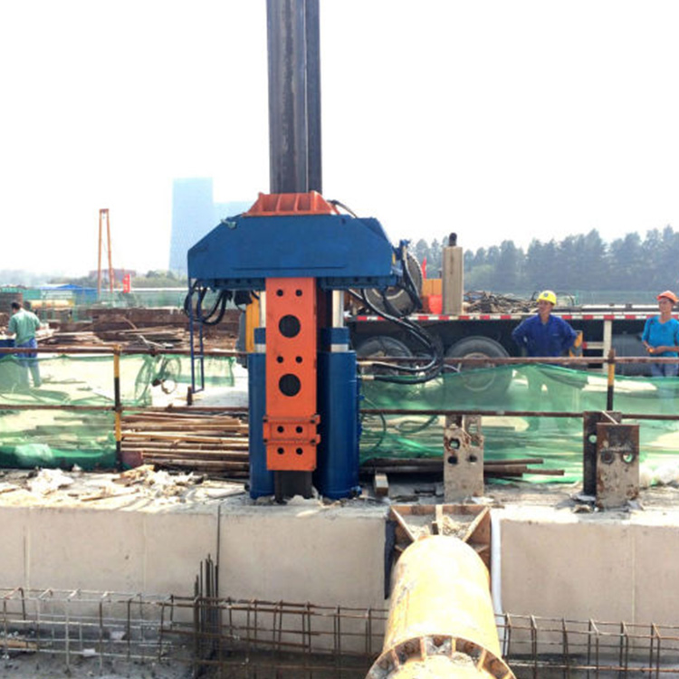 Steel pile extractor working in foundation construction project