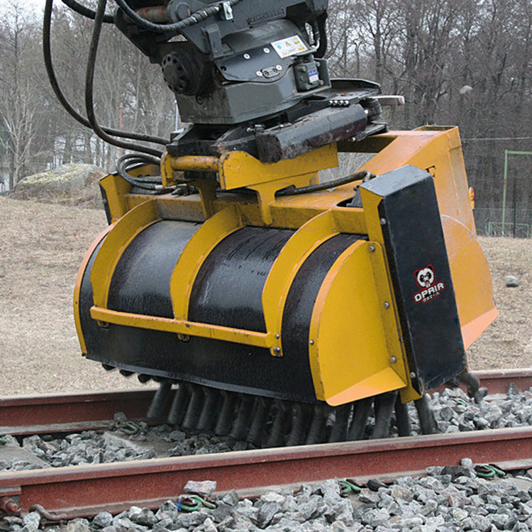 Rail Ballast Brush working on railway track ballast