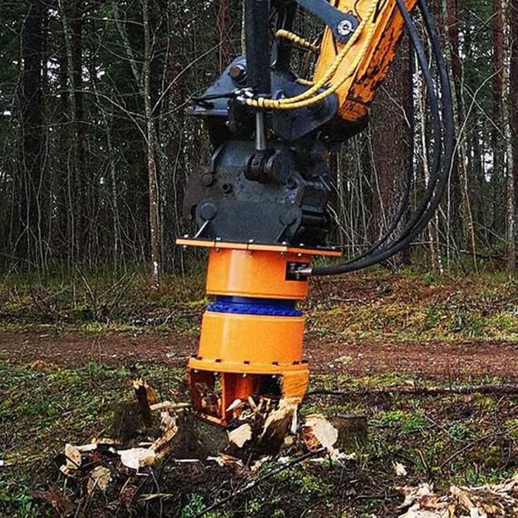 stump planer attachment breaking down tree stump in forestry cleanup