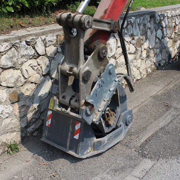 excavator road planer milling along curb edge