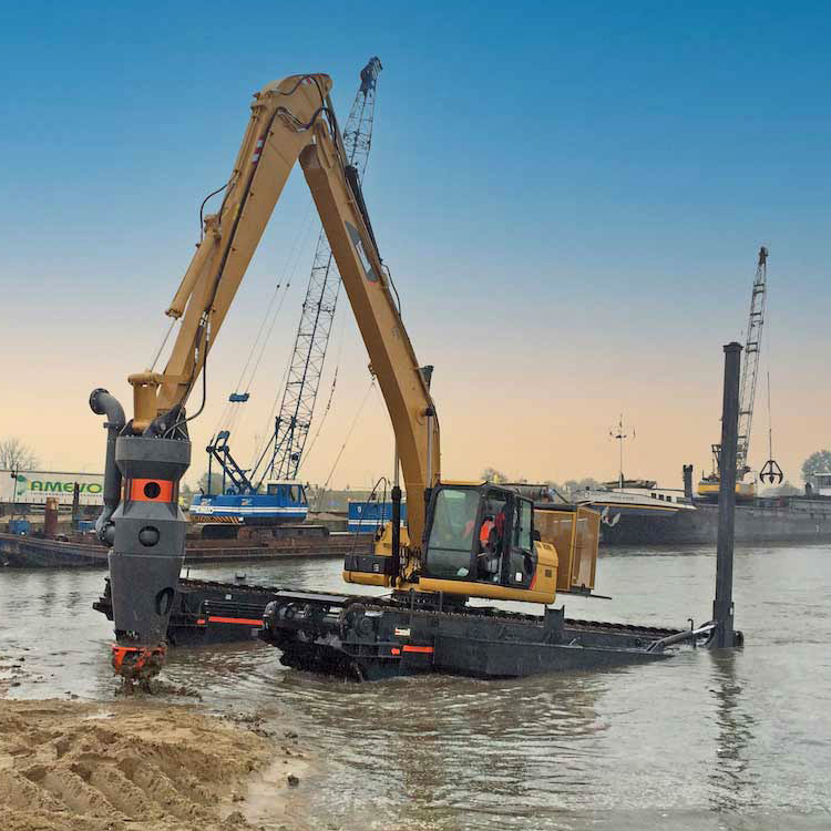 Harbor dredge pump on amphibious excavator for sediment transfer