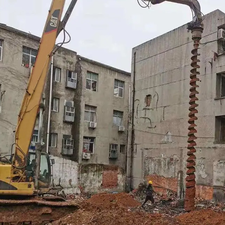 auger piling rig working on redevelopment foundation drilling project