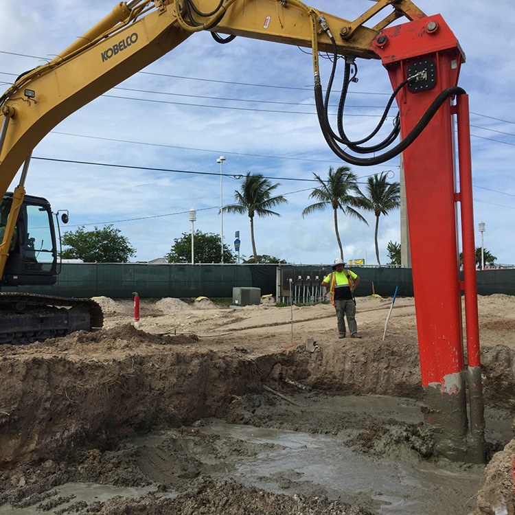 excavator mixing head operating in wet trench area