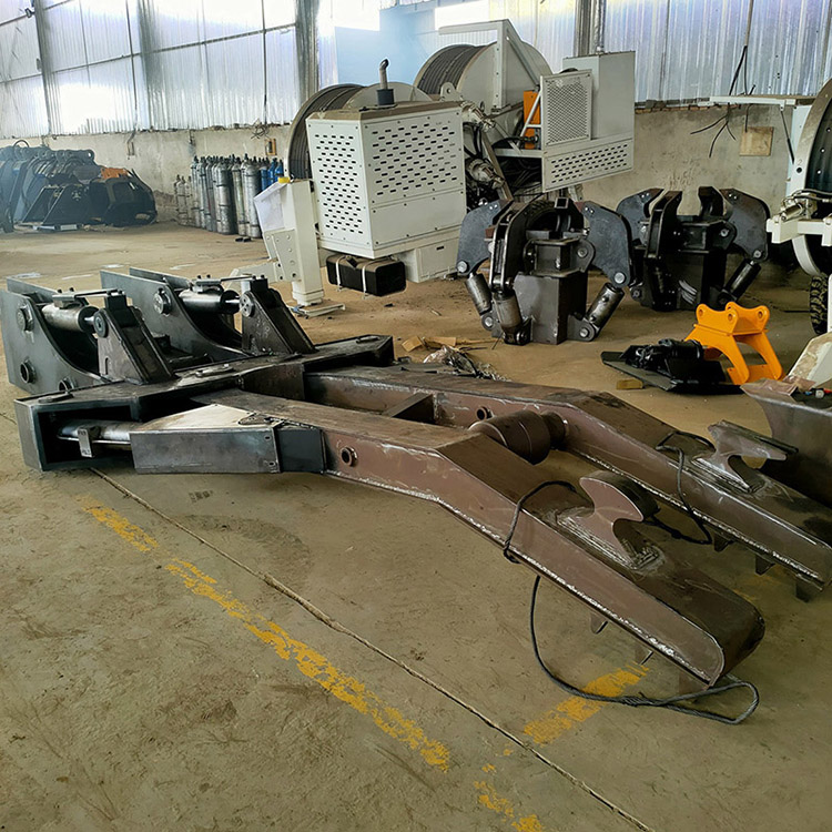 excavator clamp arm in workshop