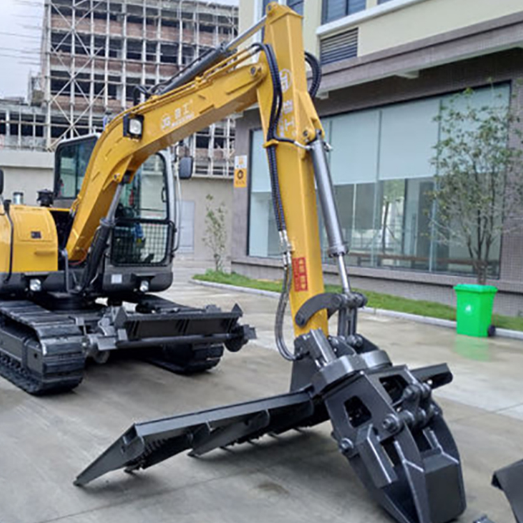 Sleeper Grabber attachment displayed on compact excavator for rail maintenance
