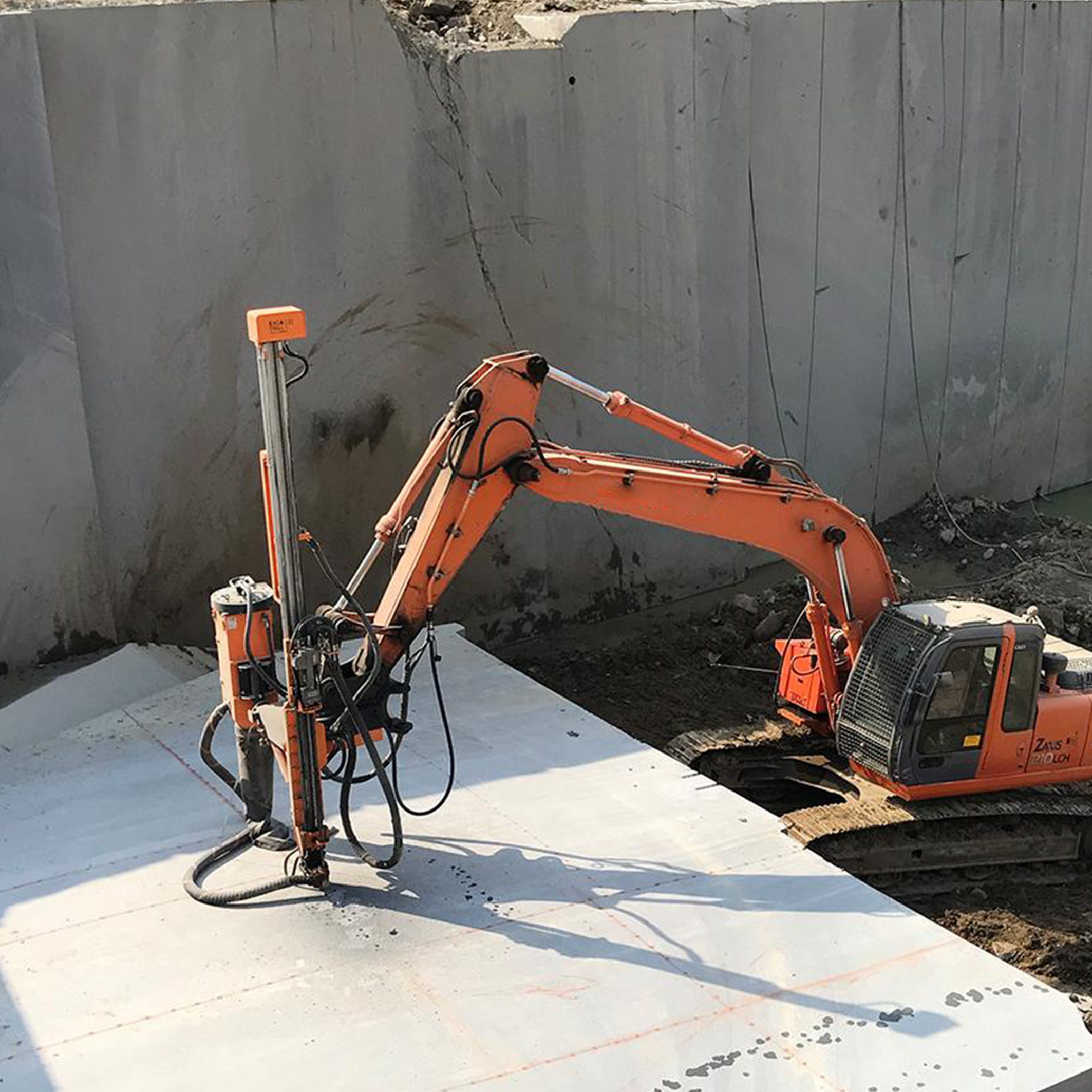 Excavator Mounted Drilling Attachment for confined foundation drilling