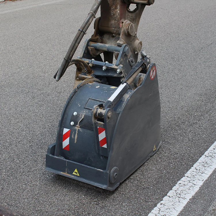 asphalt planer attachment mounted on excavator