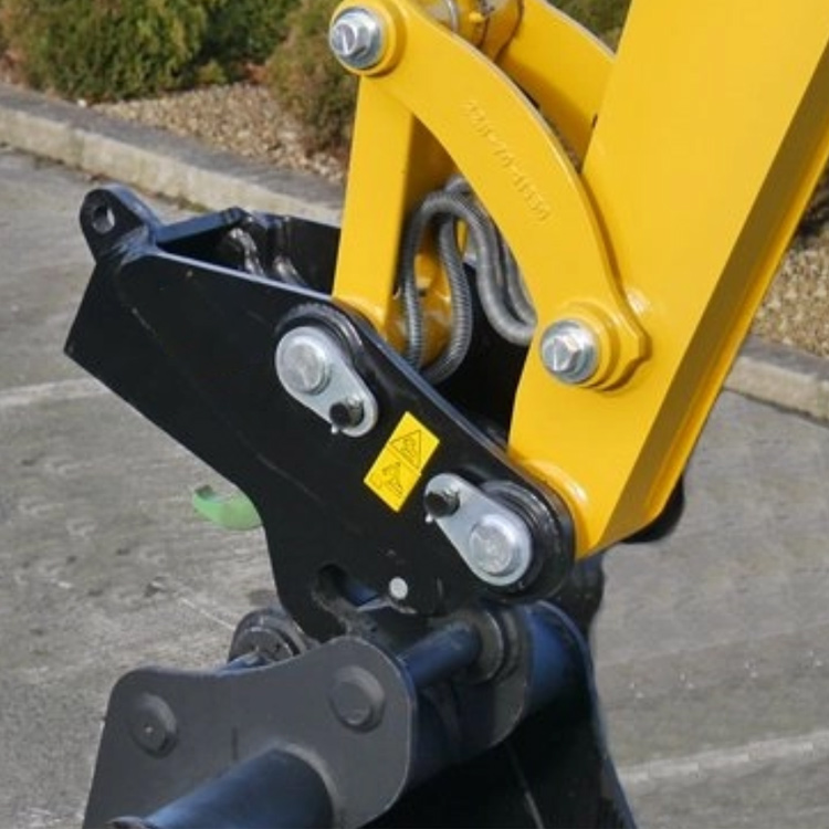 quick connect coupler on compact excavator arm