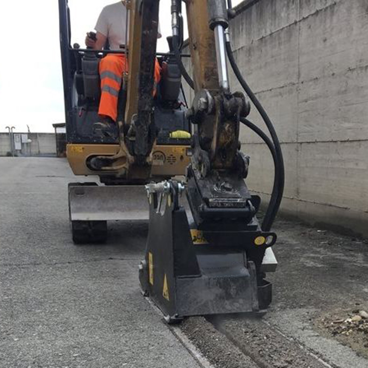 excavator milling attachment cutting narrow pavement line