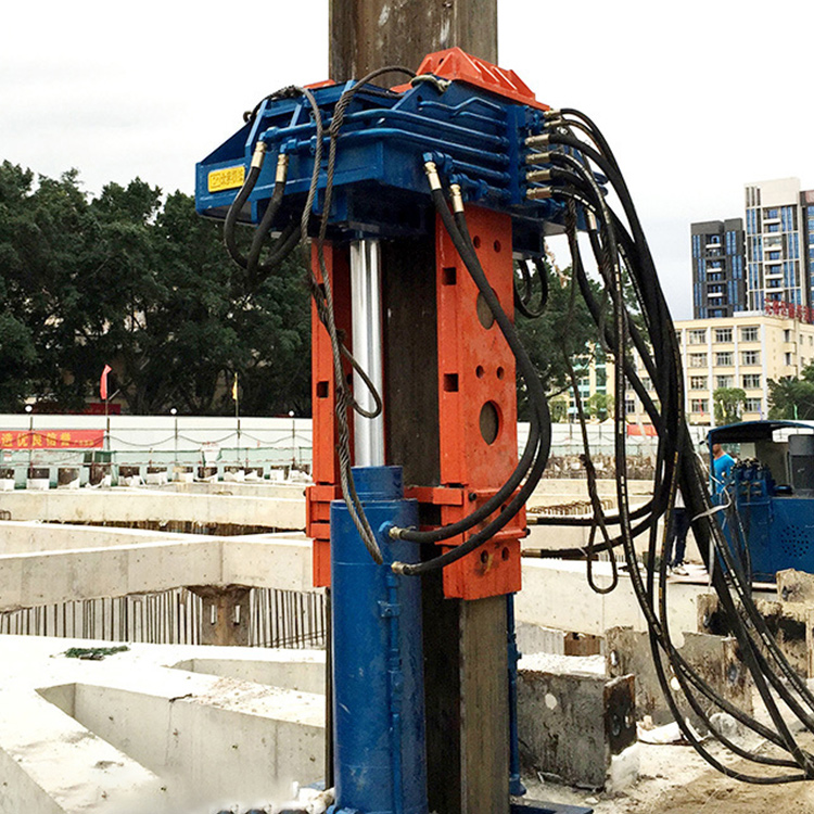 Pile extraction machine removing steel pile on construction site