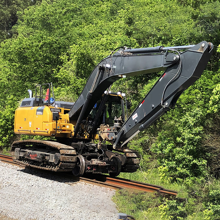 Road-rail crawler excavator working on forest rail line