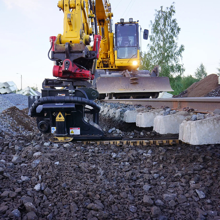 railway ballast cleaning attachment working under the track