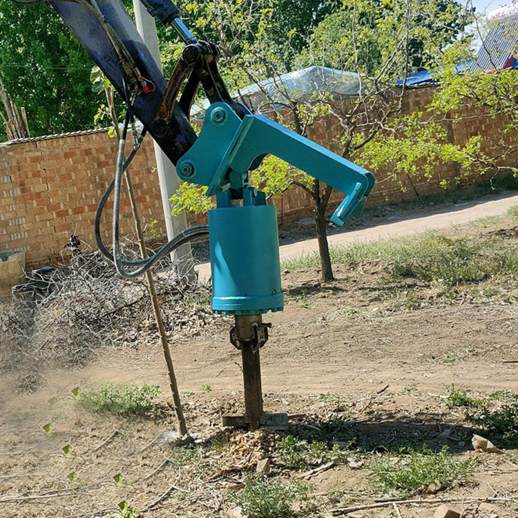 Earth Auger Attachment mounted on excavator during ground drilling work