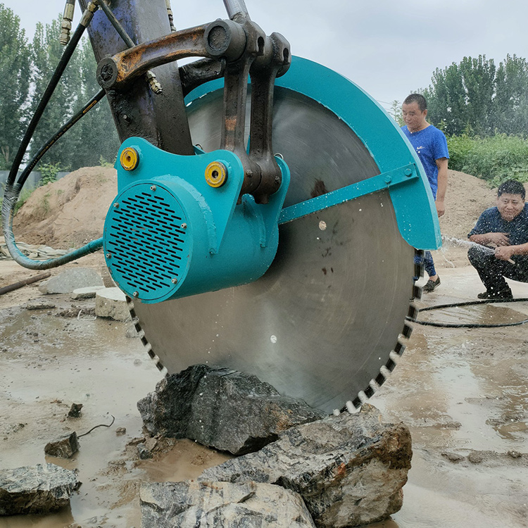 excavator rock saw cutting natural stone on site