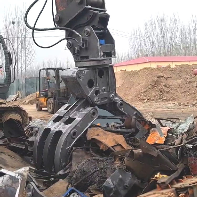 scrap handling grapple sorting and loading metal waste