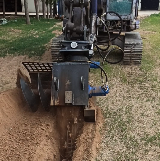 chain trenching attachment front working view
