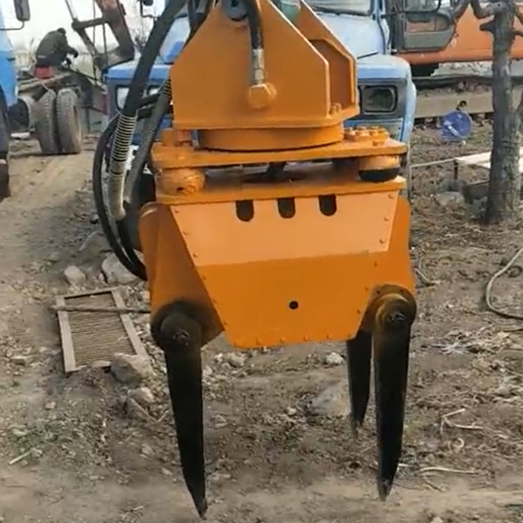 tamping head attachment front view on jobsite