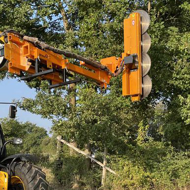 Hydraulic Disc Hedge Trimmer on extended arm trimming high vegetation