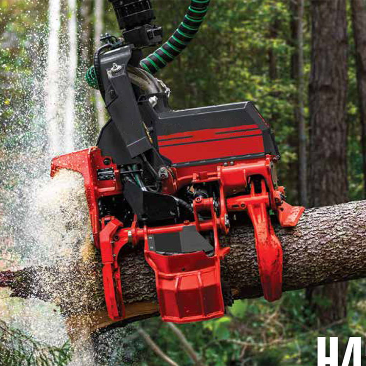 Harvesting head cutting timber in forestLogging harvester head making cross cut on log