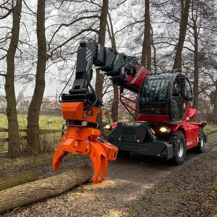 Forestry excavator grapple saw handling a cut log on the ground