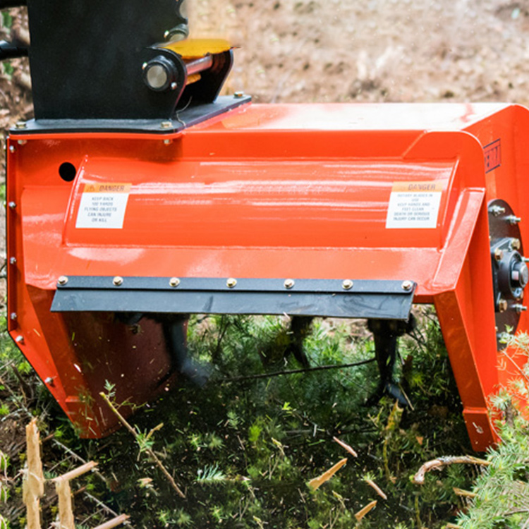 Mini excavator mulcher front working view cutting dense brush near ground
